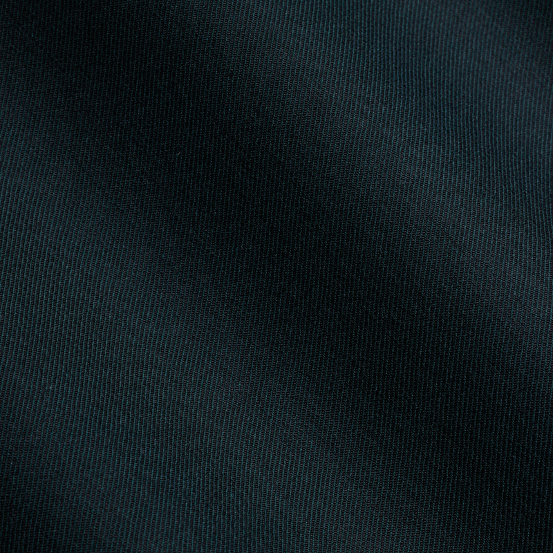 Fabric details of the Savile Row Tailored Fit Mens Abram Suit in Forest Green Pure Wool