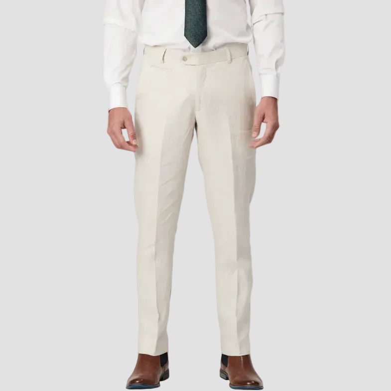 Pure linen pants in Ecru by Savile Row with a white shirt, green patterned tie and brown leather shoes.