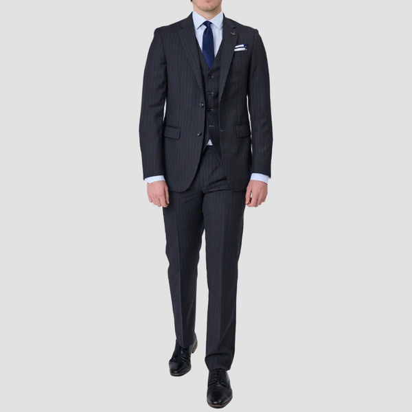 Charcoal stripe suit in Australian merino wool by Savile Row with a blue tie and pocket square, and black leather shoes.