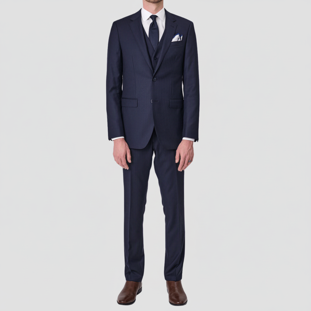 Tailored navy Tasmanian wool suit with Super 120s softness and a striking London lining by Savile Row.