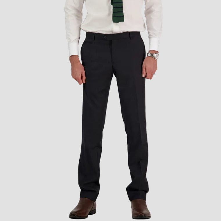 A man wearing a classic fit charcoal gray suit trouser by Savile Row.