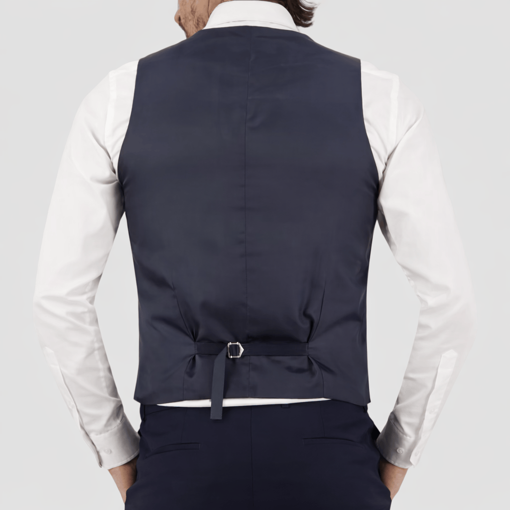 Tailored navy travel‑finish wool vest by Savile Row, cut in Super 110’s Merino with a refined satin back.