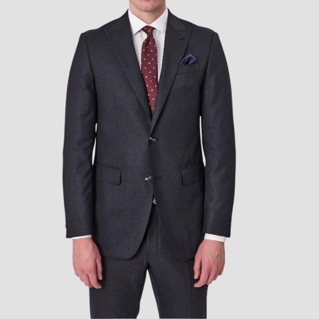 Dark gray suit with a red patterned tie and white shirt