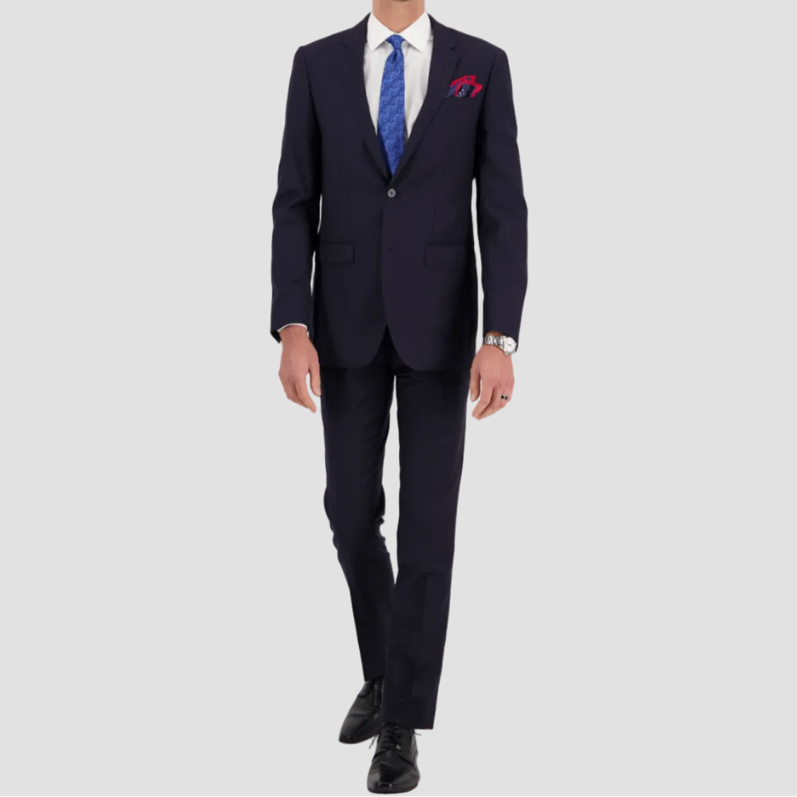 Navy Big Men’s tailored travel suit in Super 110s Merino wool by Savile Row. 