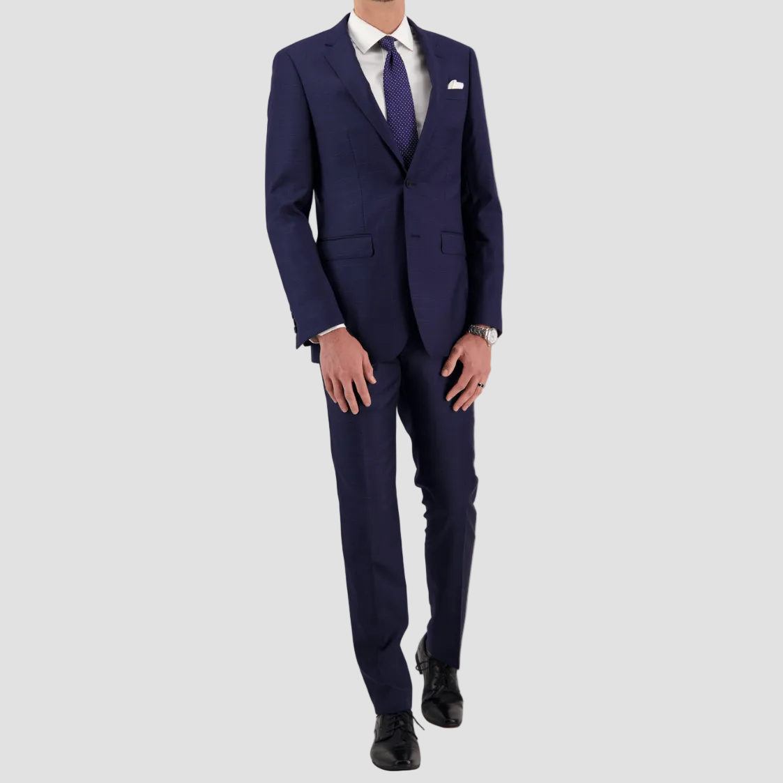 Refined navy Merino wool suit by Savile Row—tailored fit, sharp notch lapel and two-button design, perfect for business, events, and elevated occasions.