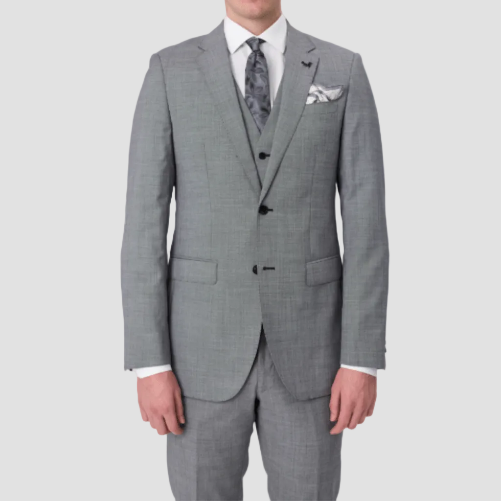 Chrome Australian merino wool textured suit by Savile Row with a silver tie with black patterns, and a white pocket square with grey edges.