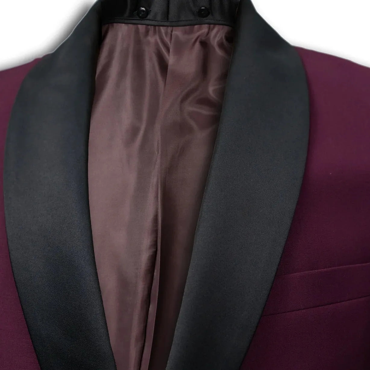 A close-up of a men's formal jacket featuring a deep burgundy body and contrasting black satin shawl lapels, with a matching burgundy satin inner lining.