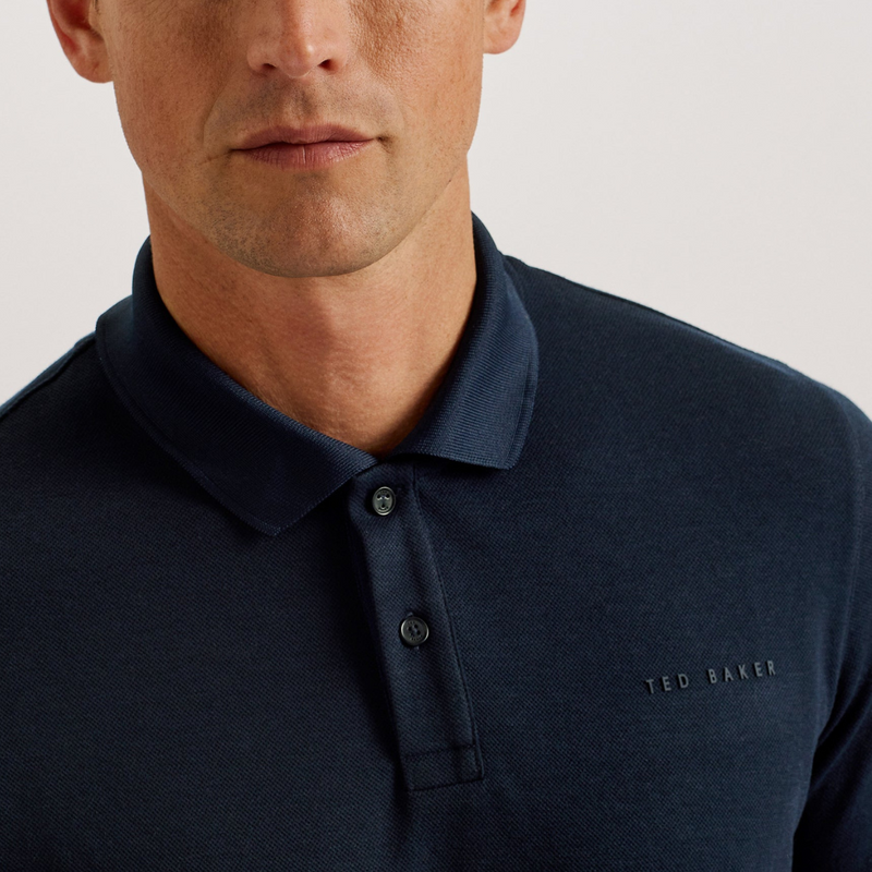 Close up details of the Slim Fit Karty Mens Knit Polo in Navy by Ted Baker