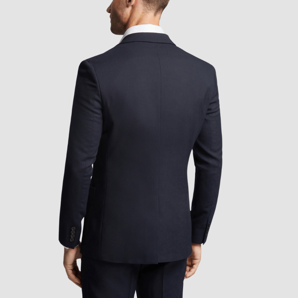 Back view of the Mens Slim Fit Kepler Suit in Navy