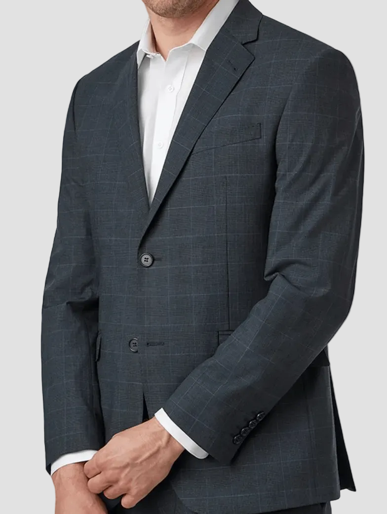 Gray checkered suit jacket worn by a person on a gray background