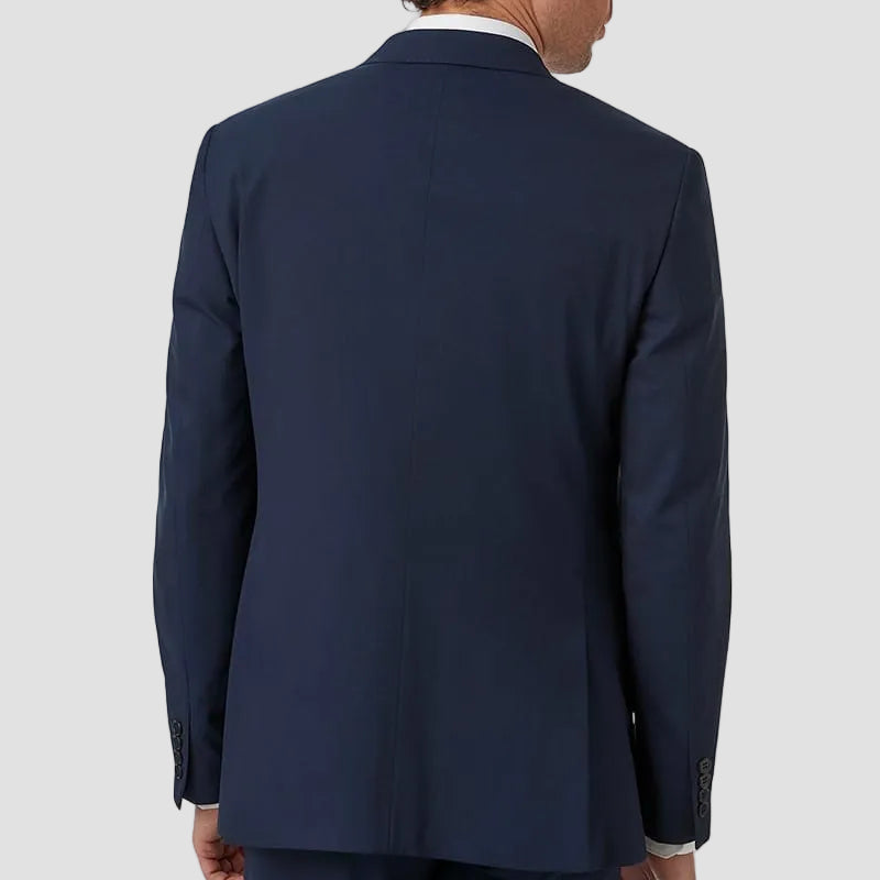 Man wearing a navy suit jacket on a white background