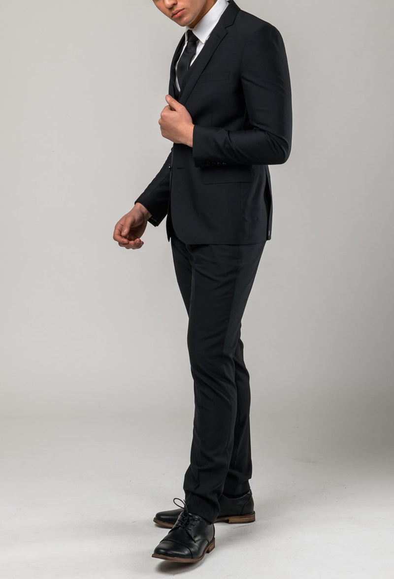 a side view of the Aston slim fit colton suit in black pure wool A0137122S