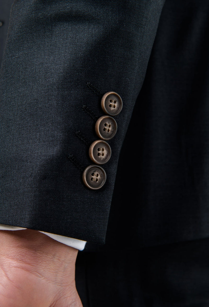 a close up view of the sleeve button details on the Aston slim fit colton suit jacket in charcoal pure wool A0220172S