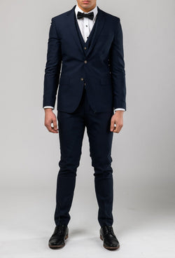 Aston slim fit colton suit in navy pure wool A0437162S full length styled with a white shirt and black bow tie