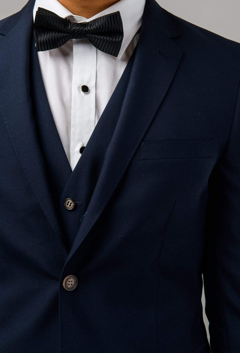 a close up view of the lapel and vest detail on the Aston slim fit colton suit in navy pure wool A0437162S