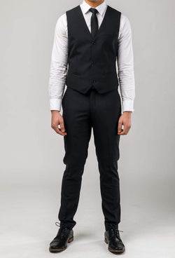 Aston slim fit colton vest in black pure wool A0137122V styled with a white shirt and black tie