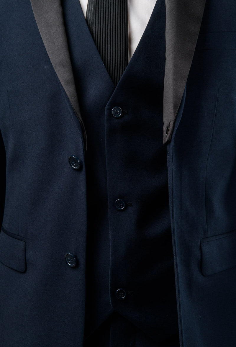 a close up view of the satin lapel detailing and vest buttons on the Aston slim fit moores vest in navy A049301V-NL