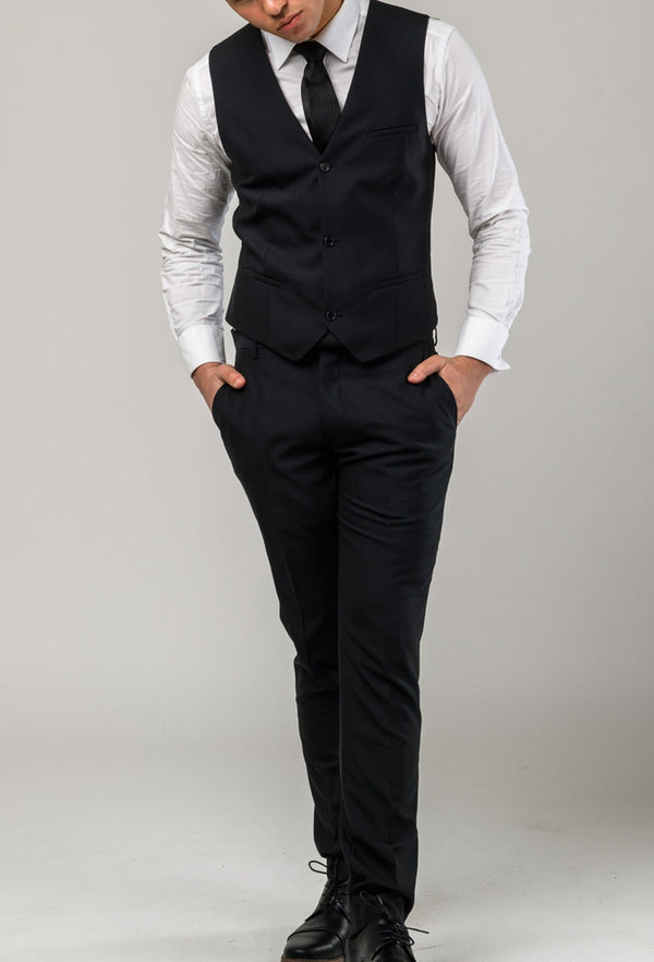 A front on view of a model wearing the Aston slim fit moores vest in black A019301V-NL