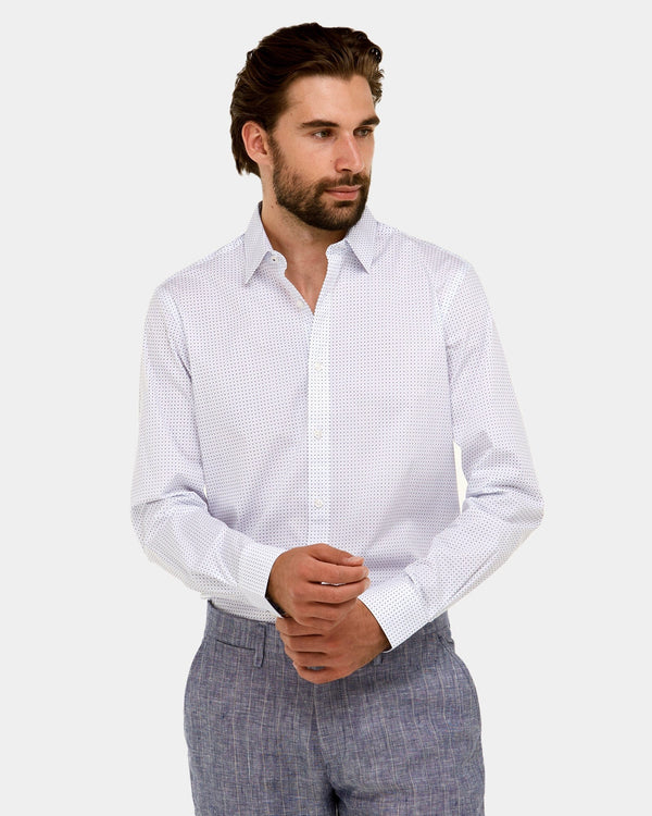 a white mens business shirt with subtle blue square print all over