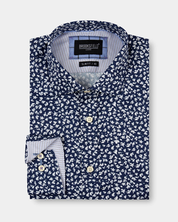 a long sleeve navy mens dress shirt with a detailed white floral pattern all over