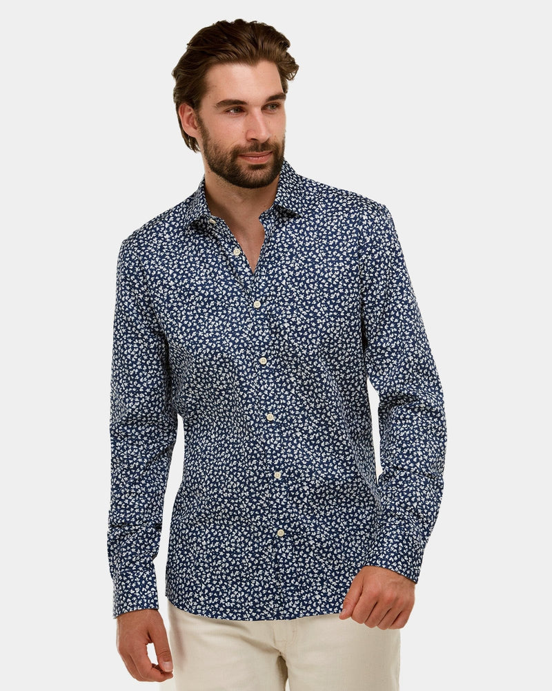 a slim fit mens dress shirt in a navy and white floral print