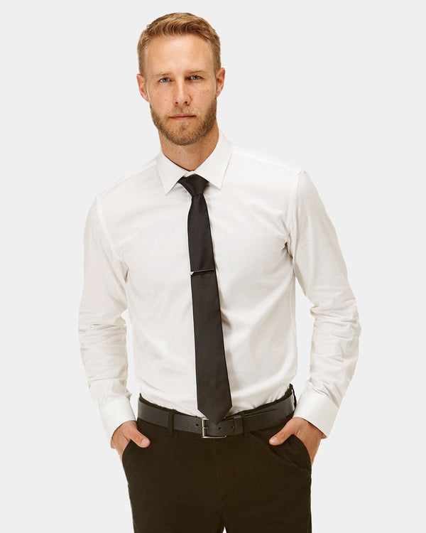 a man wears the brooksfield mens white dress shirt the occasion shirt