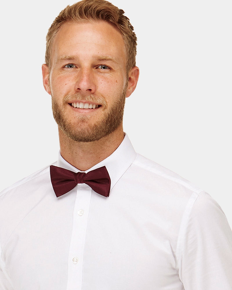 mens white shirt with a burgundy bow tie