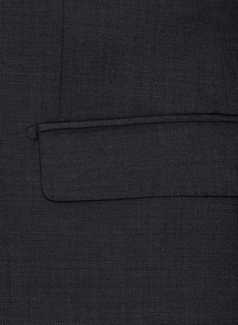 A close up view of the pocket detail on the Cambridge classic fit range suit jacket in charcoal pure wool F2800