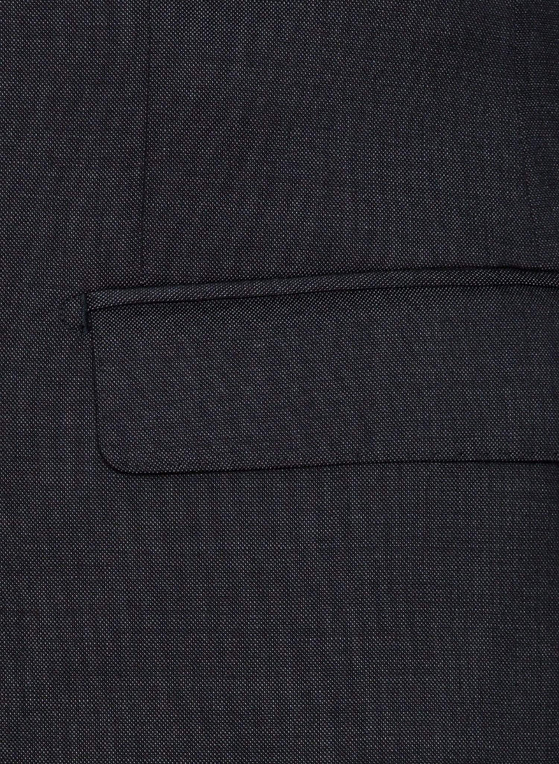A close up view of the pocket detail on the Cambridge classic fit range suit jacket in charcoal pure wool F2800