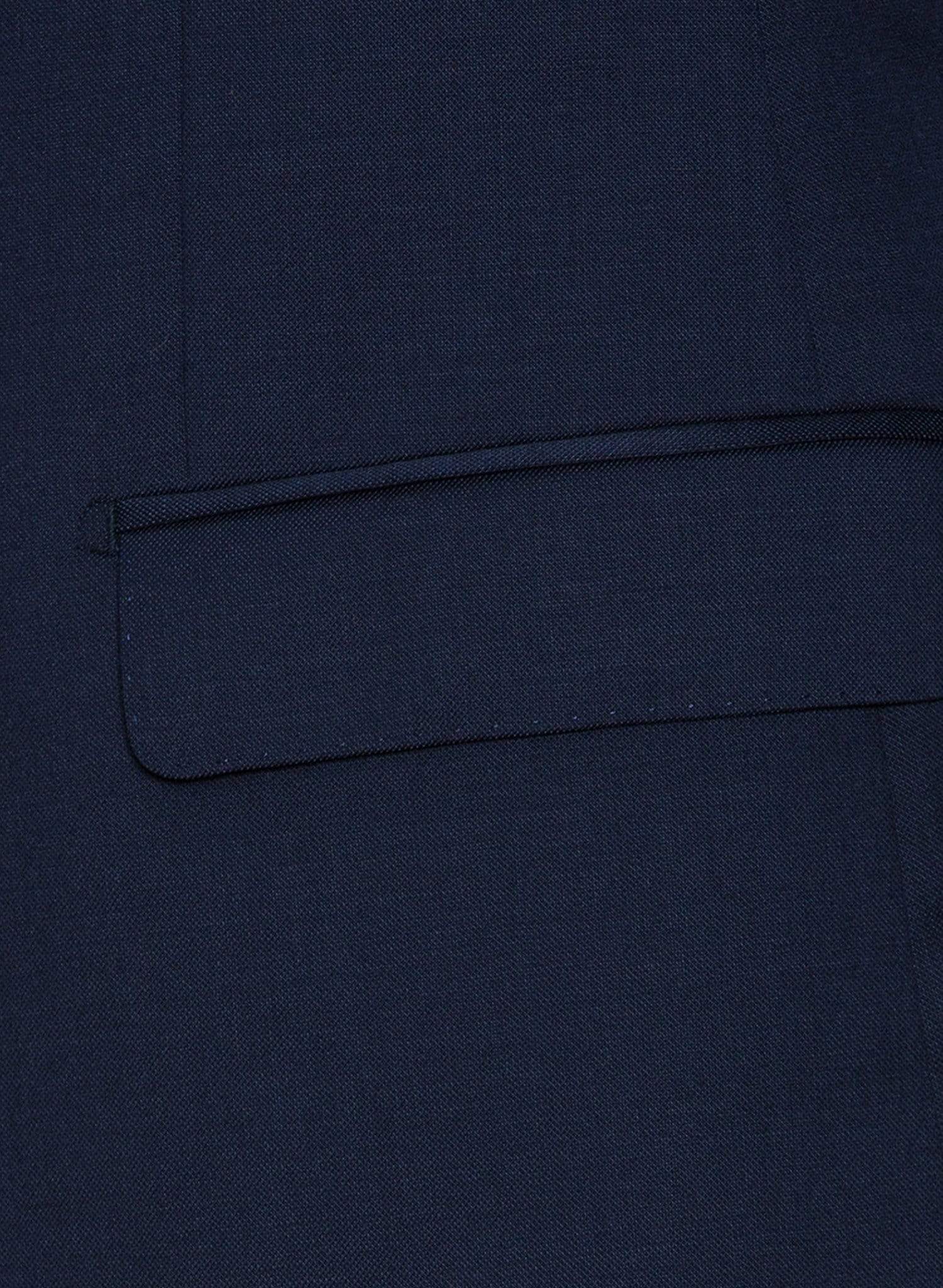 A close up view of the jacket pocket detailing on the Cambridge classic fit range suit in dark blue navy pure wool F2800
