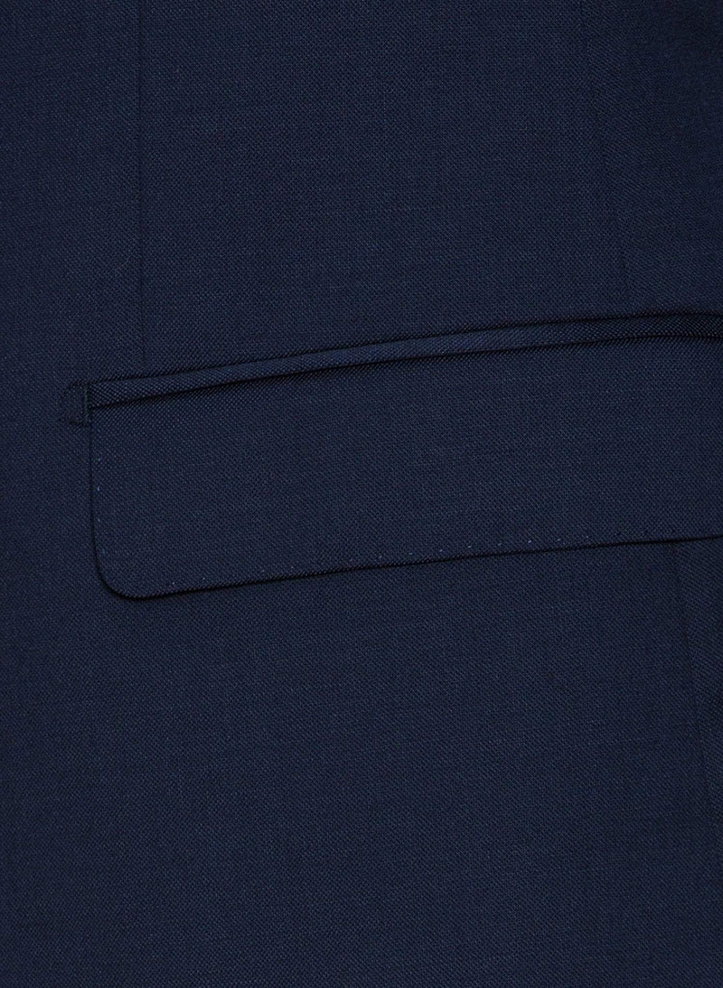 A close up view of the jacket pocket detailing on the Cambridge classic fit range suit in dark blue navy pure wool F2800