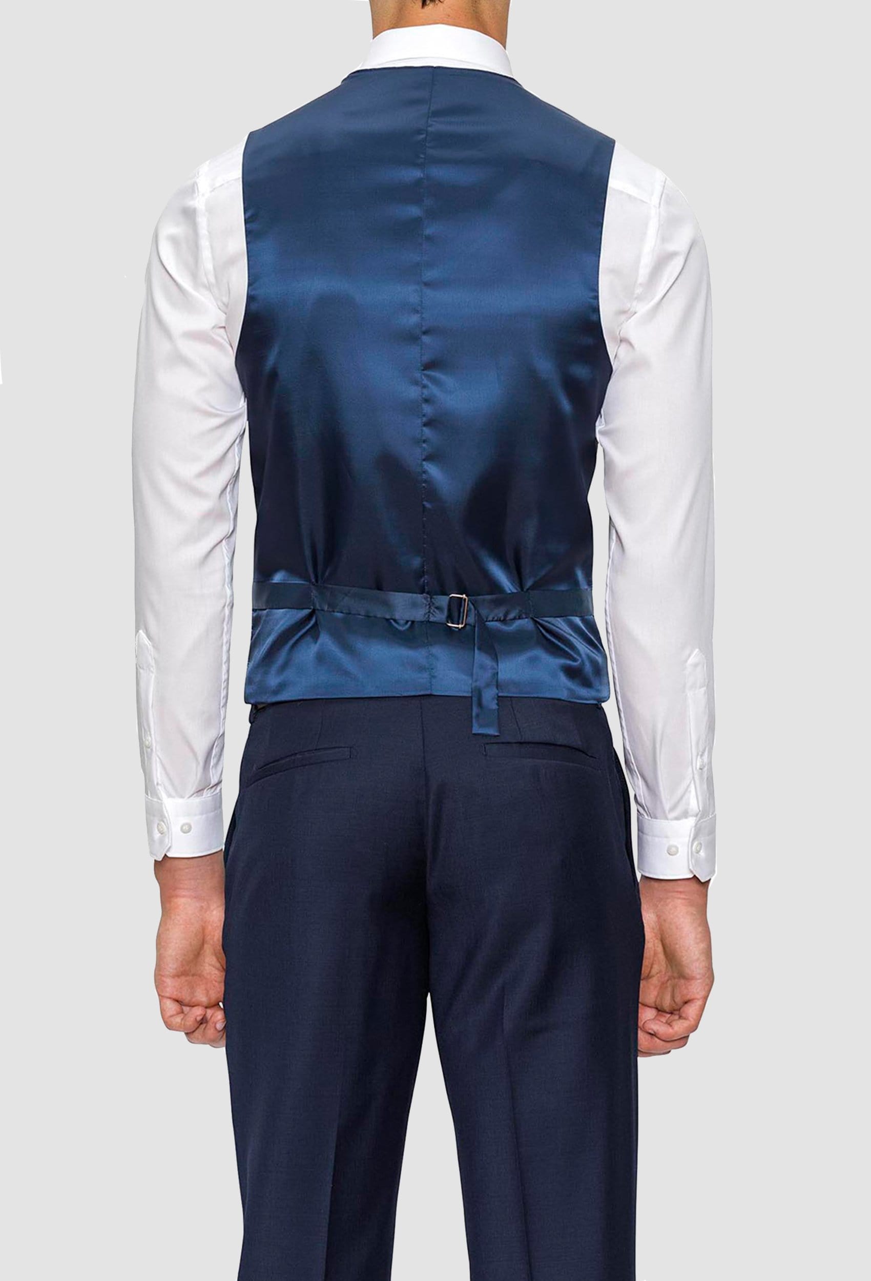 A rear view of the polyester satin look back design of the Gibson slim fit mighty vest in navy pure wool