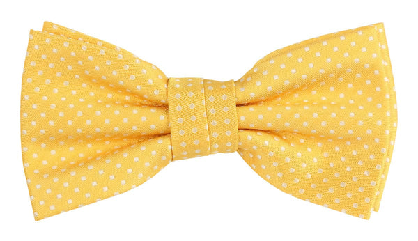 a golden yellow woven bow tie with a white spotted design