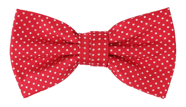 a red bow tie with small white woven spots all over