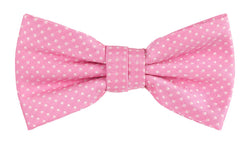 a pink bow tie with white spots