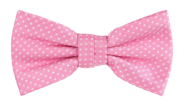 a pink bow tie with white spots