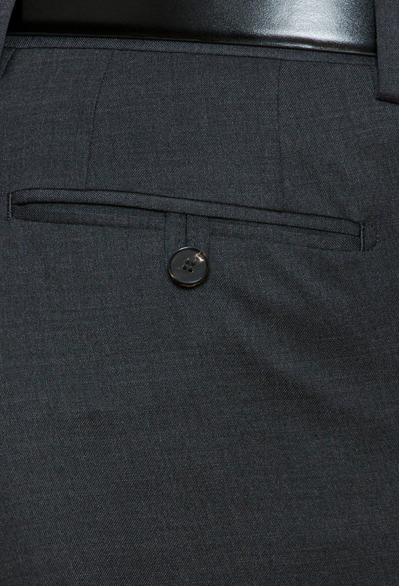 a close view of the rear hip pocket details on the Joe Black slim fit razor trouser in charcoal pure wool