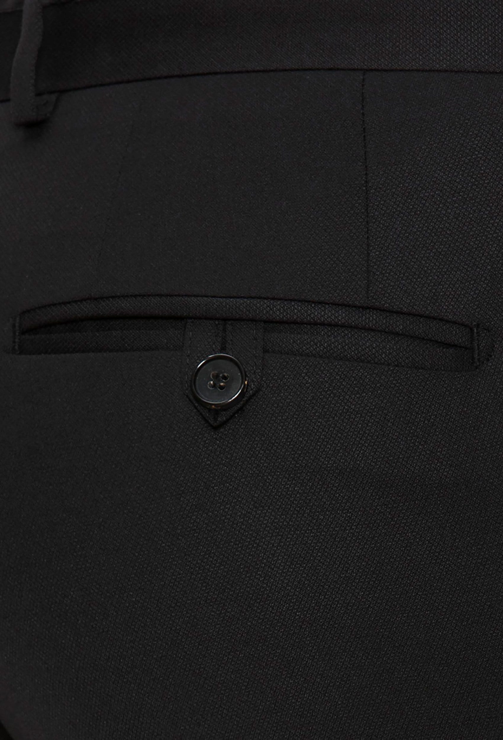 a close up view of back pocket detail on the Joe Black slim fit fortune evening trouser in black pure wool F6447
