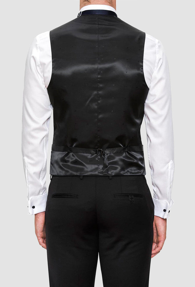 a rear view of a model wearing the Joe Black slim fit mail vest in black pure wool