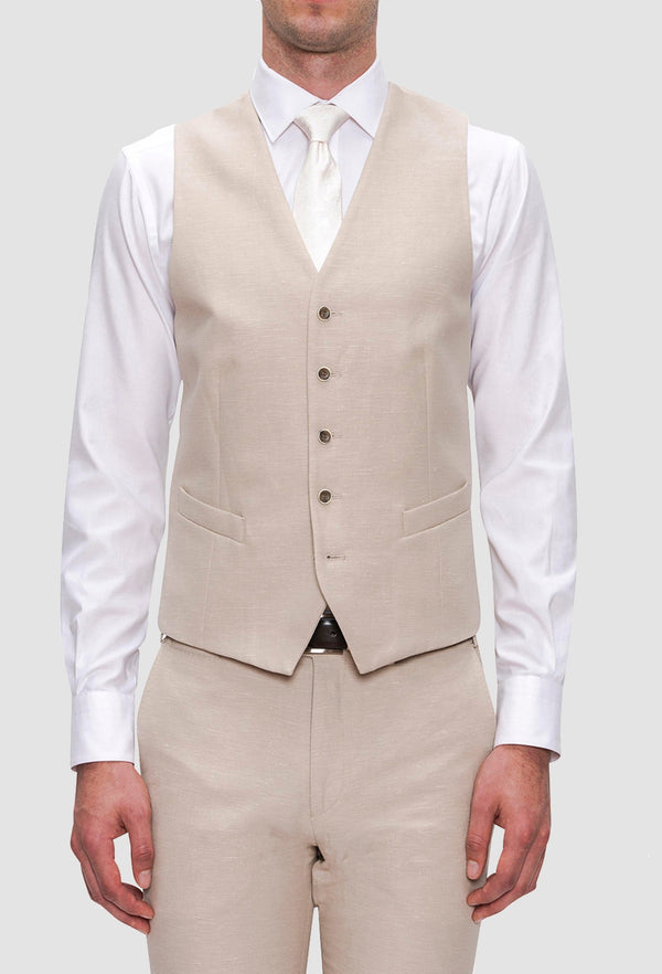 a front on view of the Joe Black slim fit mail vest in sand linen blend layered over a white shirt and white tie