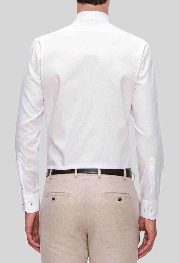 A rear view of the Joe Black slim fit pioneer shirt in white pure cotton FJD044 styled with a beige trouser