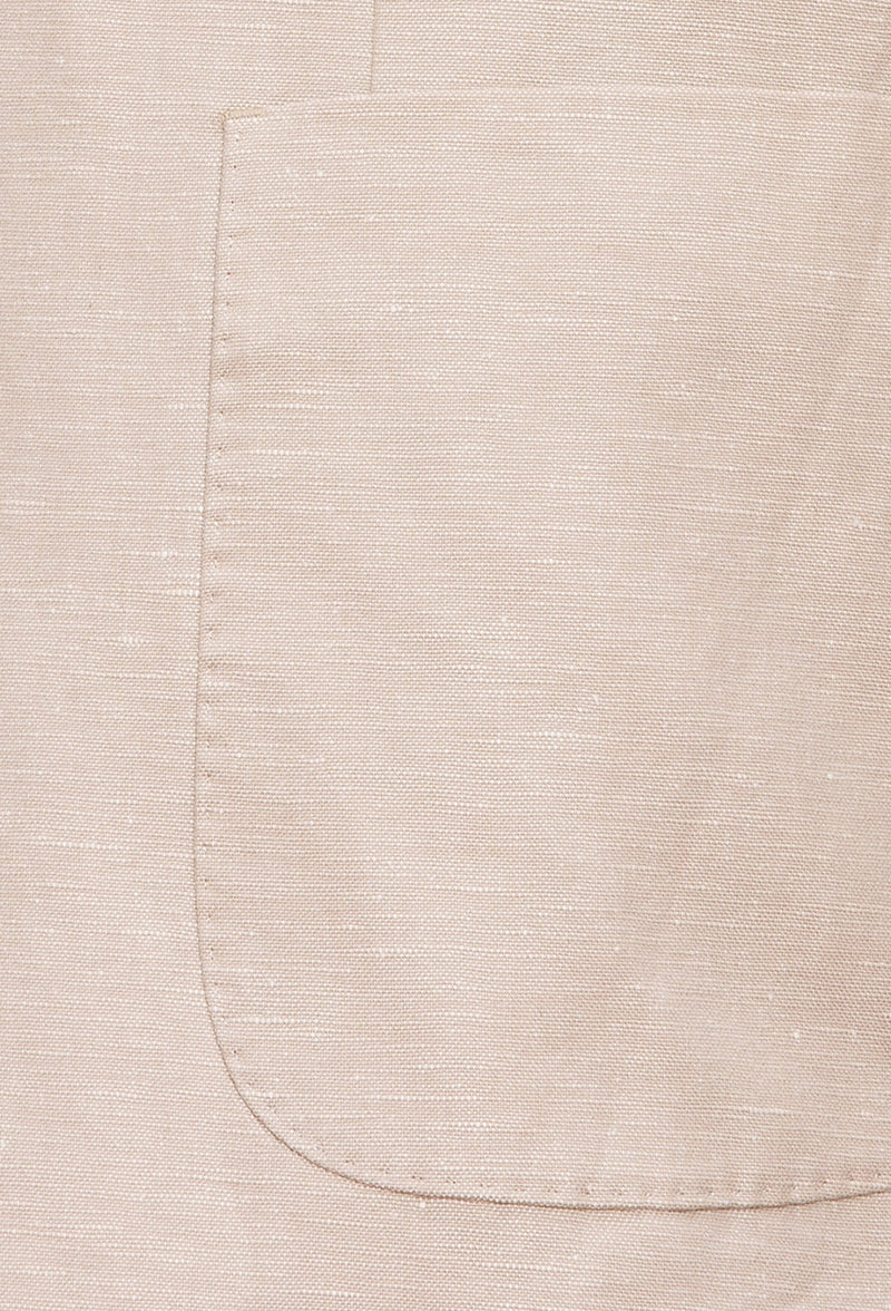 A close up view of the patch pocket detail on the Joe Black slim fit quest sports jacket in sand linen blend