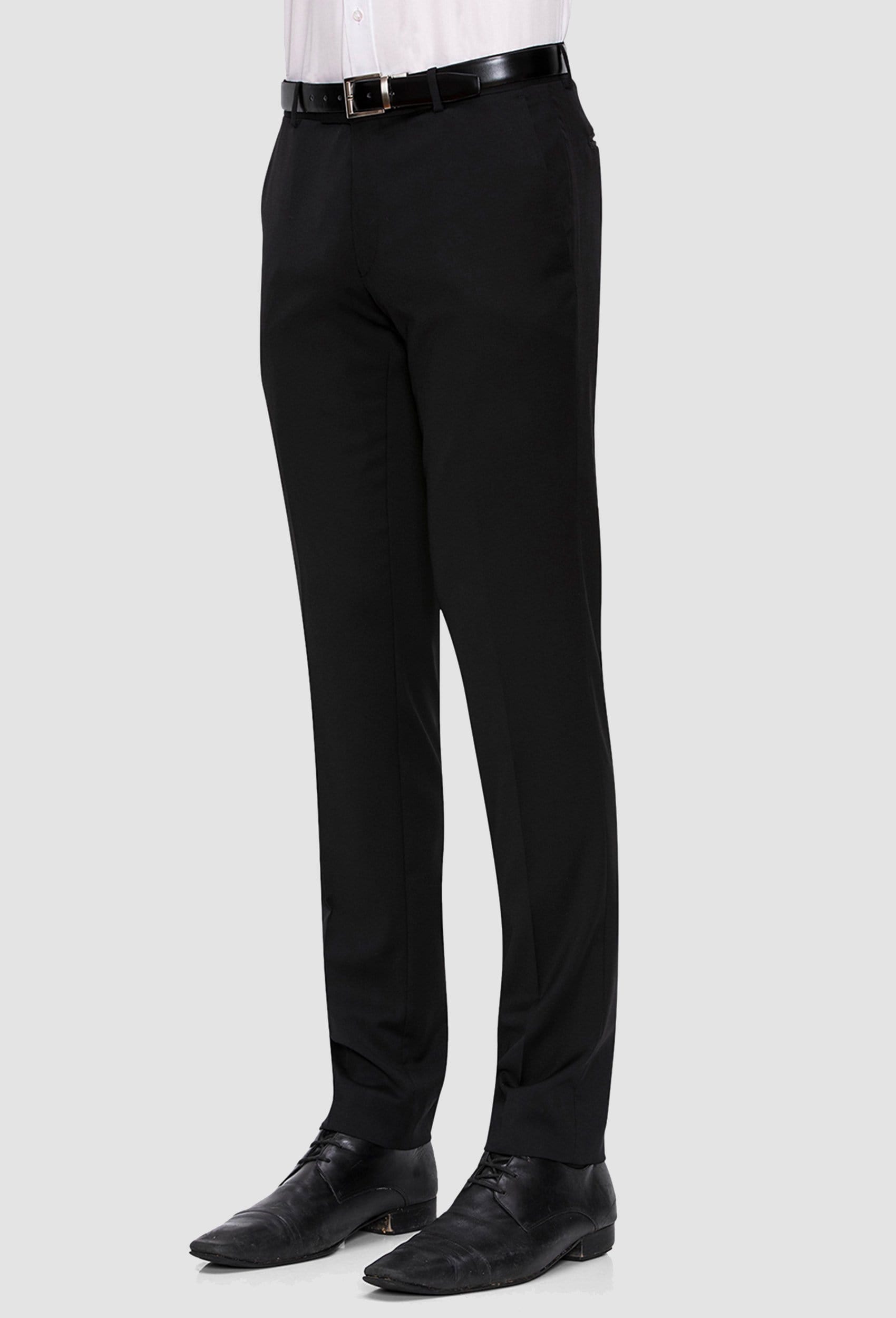 A close up view of a model wearing the Joe Black slim fit anchor suit trouser in black pure wool FJV032 against a grey background