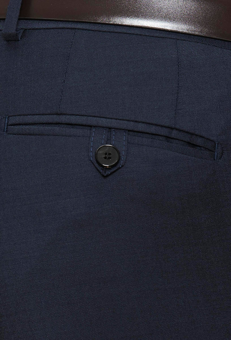 a close up view of the rear hip pocket details on the Joe Black slim fit razor trouser in navy pure wool