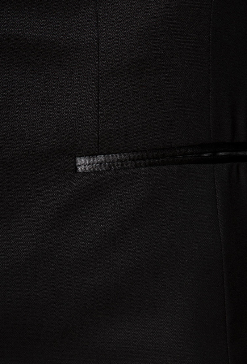 a close up picture of the satin pocket detail on the Joe Black slim fit sloane evening suit jacket in black pure wool F6447