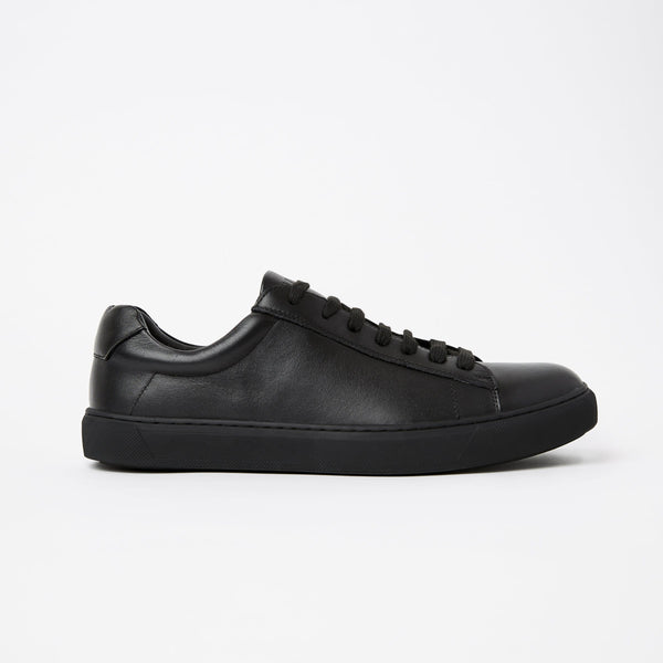 a black mens sneaker in leather the perfect dress sneaker for events