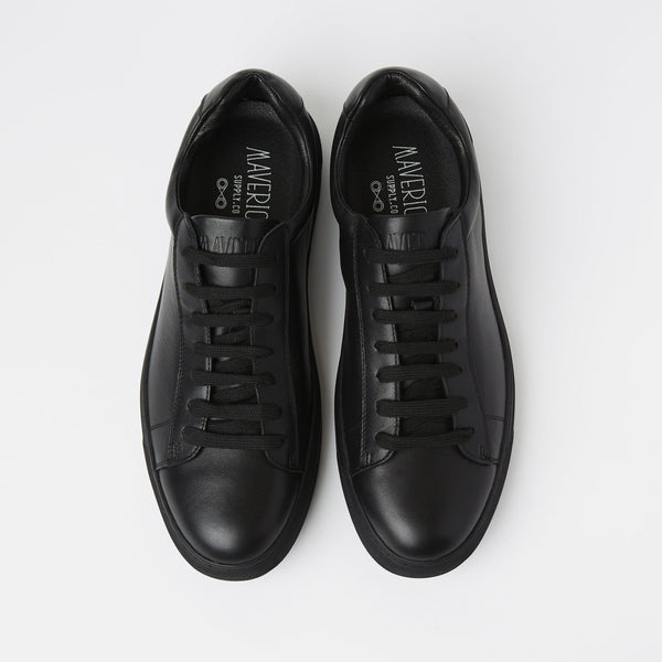 a birds eye view of a pair of black leather mens dress sneakers by mavericks