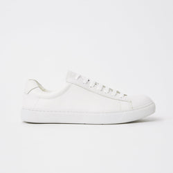 a side view of the mavericks mens white leather sneaker