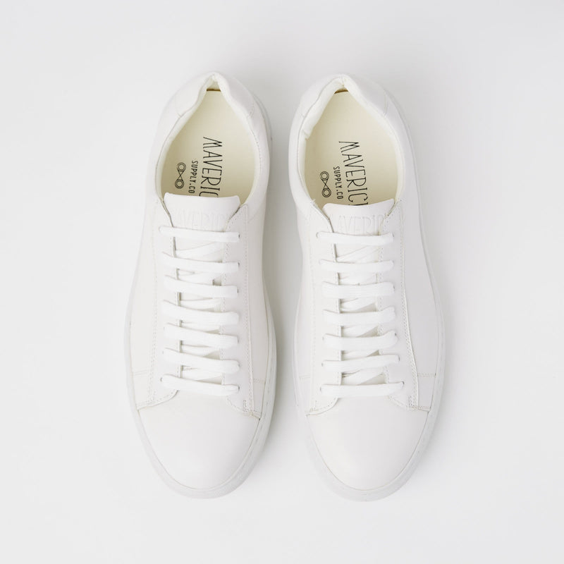 a top view of the mavericks mens white leather sneakers