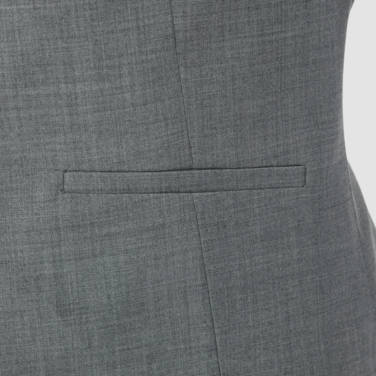 a close up view of the Uberstone slim fit tom vest in silver grey 3126 on a plain grey background